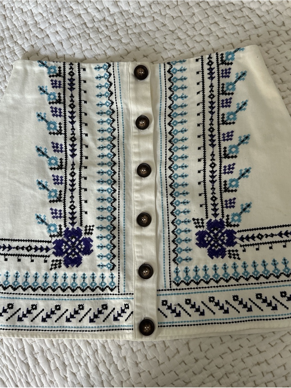 Embroidered Button-Front White Mini Skirt with Blue Floral Motif